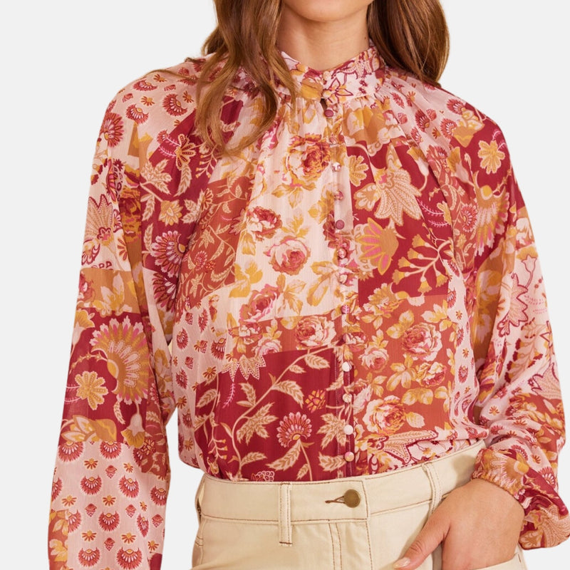 Rylee Floral Blouse has a high pleated neckline and button down bodice