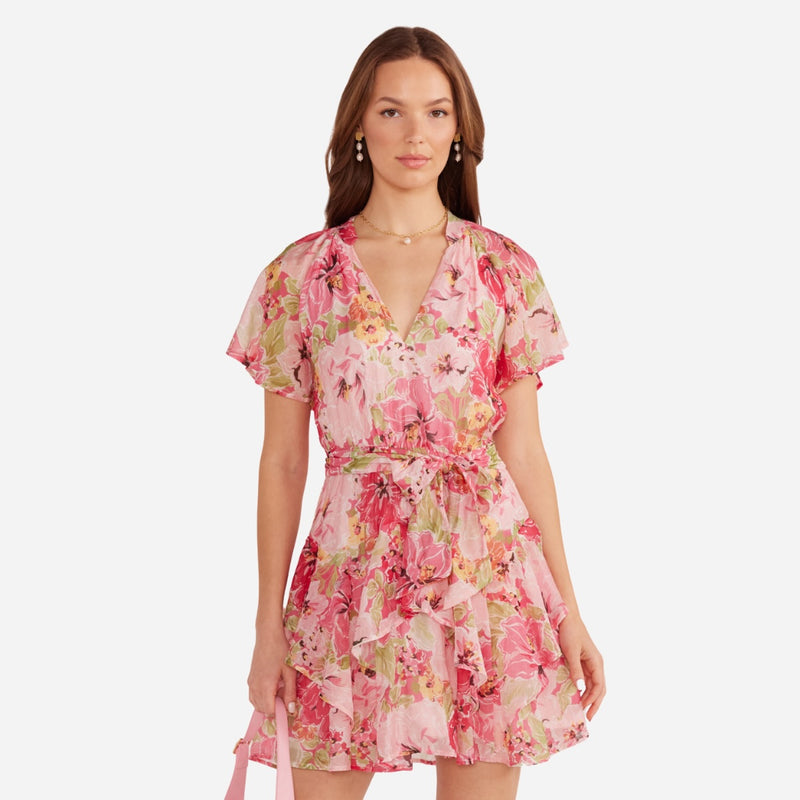 Our Simone Floral Mini Dress has a mock collar, V neckline, flutter sleeves and a tiered mini skirt