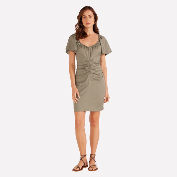 Willa Linen Dress in a khaki colour. Features a scoop neckline, short flutter sleeves and it has ruched detailing through the waist.