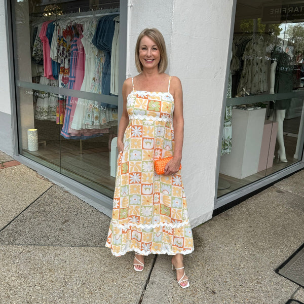 Ines Floral Maxi Dress in a yellow multi print and it has pockets!