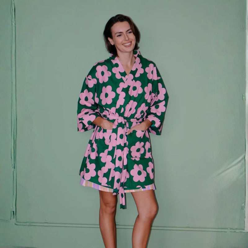 Our Mosey Me Flowerbed Short Robe has a colourful pink and green flower print.