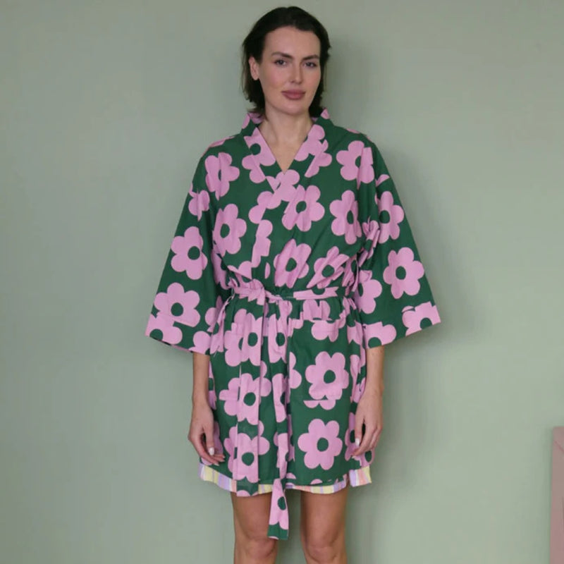 Its a kimino style robe and features a detachable self print fabric waist tie.