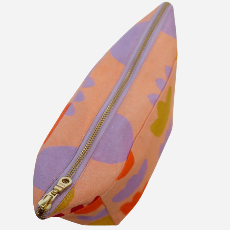 It has a gold zip closure.