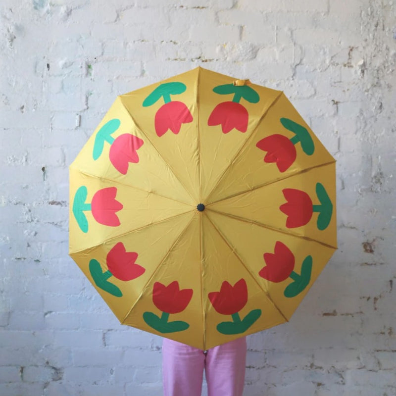 Mosey Me Tulip Umbrella with a colourful tulip artwork in yellow, red and green.