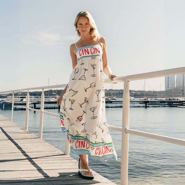 This sundress has 'Cin Cin' on the bodice and also along the hem.