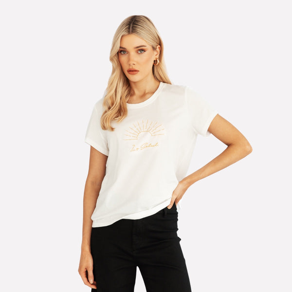 La Saleil Tee in white with gold embroidery on the front
