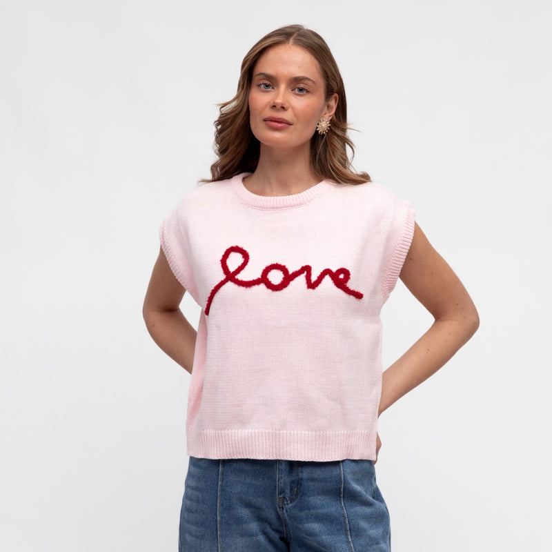 It has a round neckline, extended sleeve and a ribbed hem.