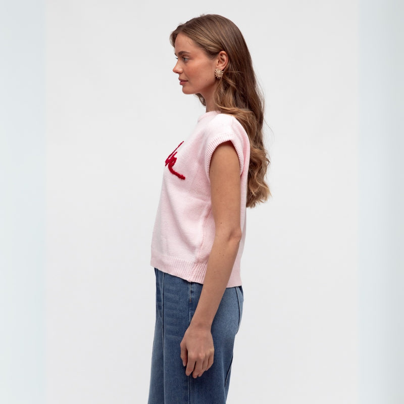 Side view of the knitted vest top.