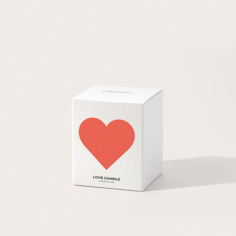 Packaged in a white box with an red heart on the front.