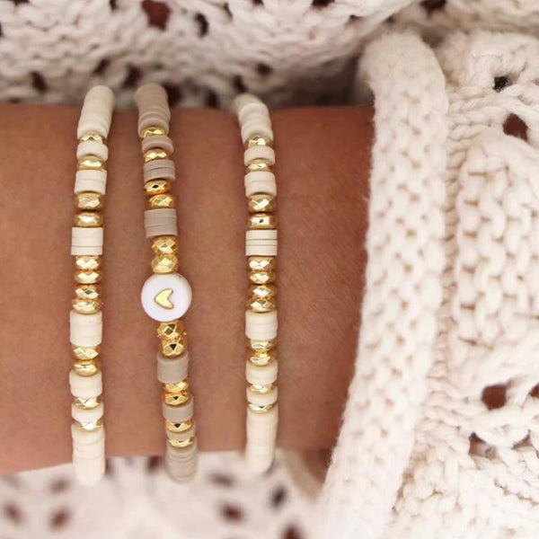Autumn Love Heishi Stretch Bracelet in White (pictured on the left and right)