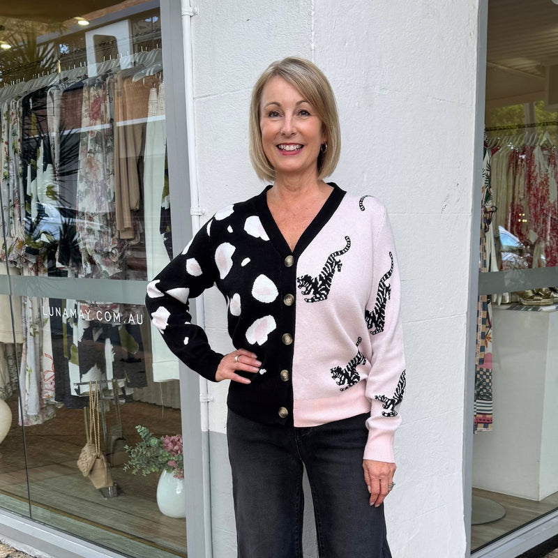 Ira Leopard Cardigan in black and pink.