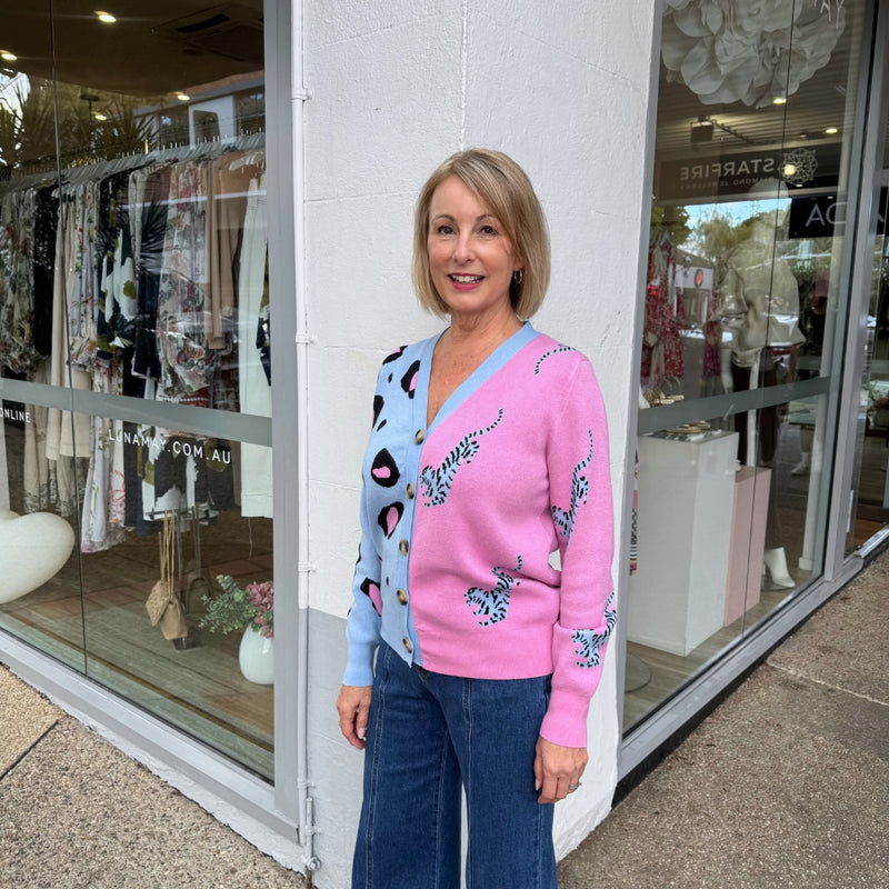 This colourful cardigan has contrasting leopard designs on each side.