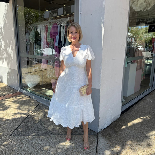 Our Kaydence Broderie Dress is a stunning style that's also classic.