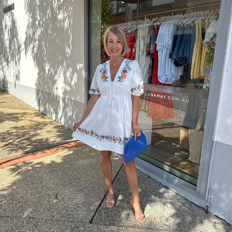 Tanya is 165cm tall, typically a Size 8-10 and wears a Size 8 in this dress.