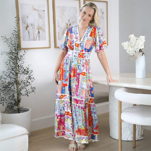 Our Penelope Maxi Dress has a colourful floral patchwork print.