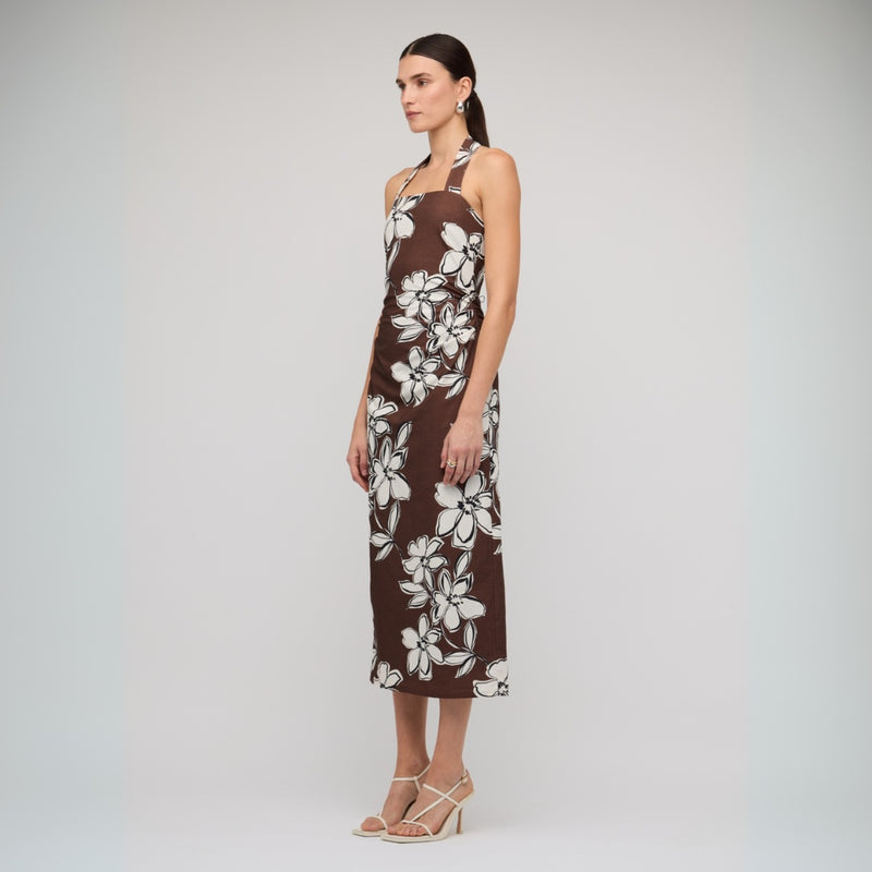 Side view of the dress - it has gathered ruching along the waistline.