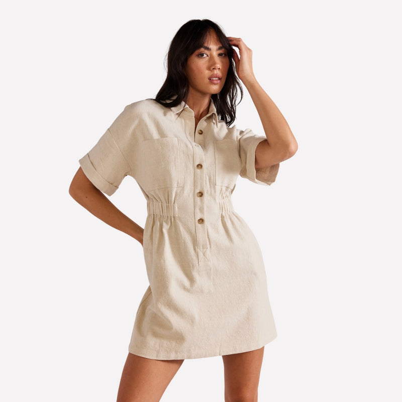 The Ethos Shirt Dress has a button front (extending to the waist), short sleeves and elasticated panels on the waist