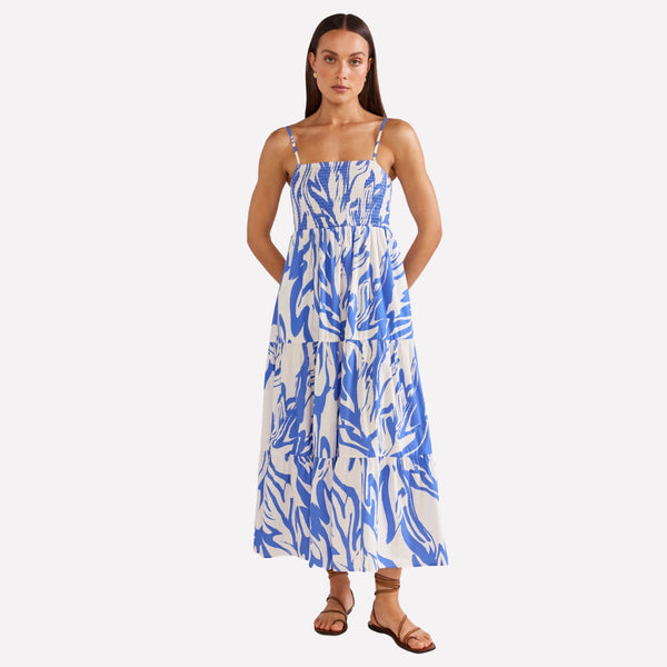 Mariella Shirred Sun Dress with a bold blue and white abstract print.
