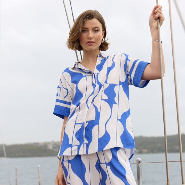 Our Santi Printed Shirt is available in a blue and white abstract print.