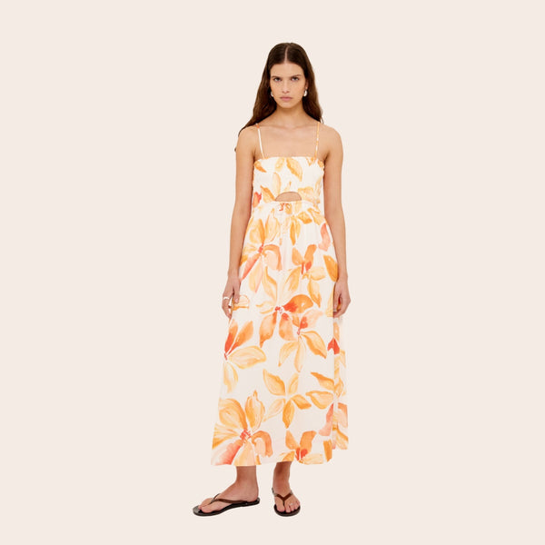 This sundress has a square neckline, shirred bodice, cut-out on the waistline and a full midi skirt.