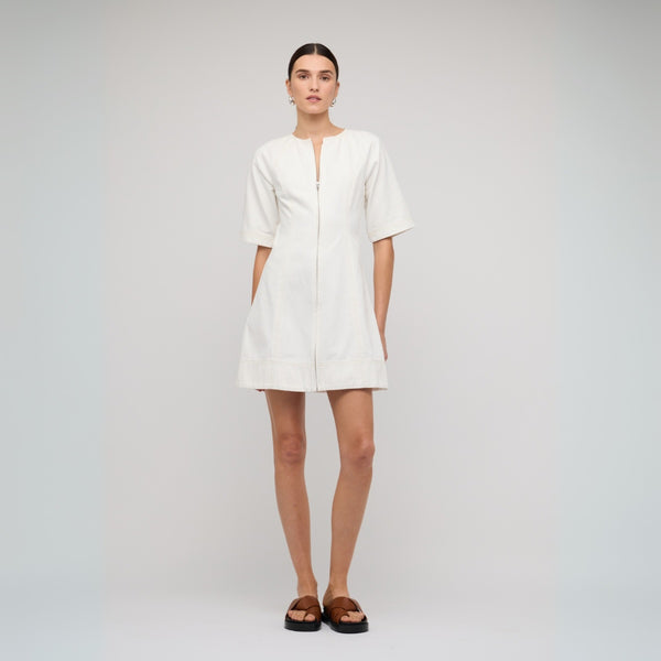 Our Zenith Denim Dress in an off-white colour.