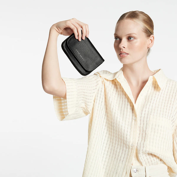 the front has a fold over flap.