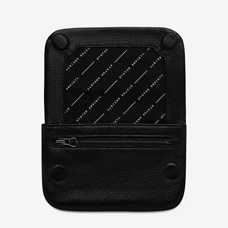 Inside the wallet, it has a zip compartment and internal compartment for notes.