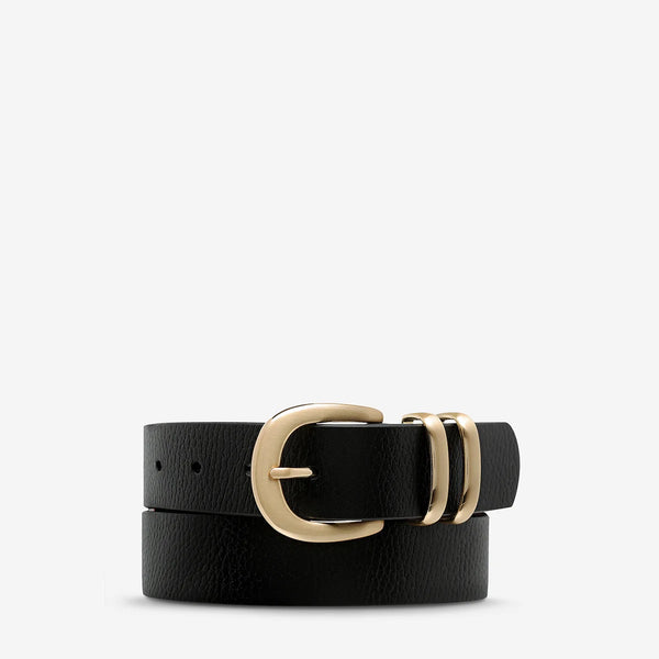 Let It Be Leather Wallet by Status Anxiety in black with gold hardware.