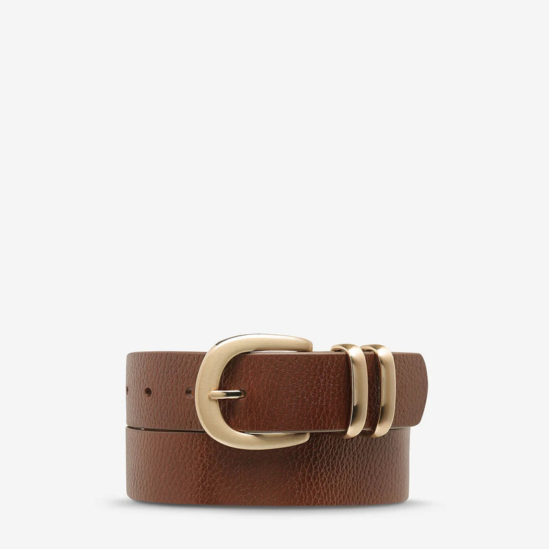 This leather belt has gold hardware