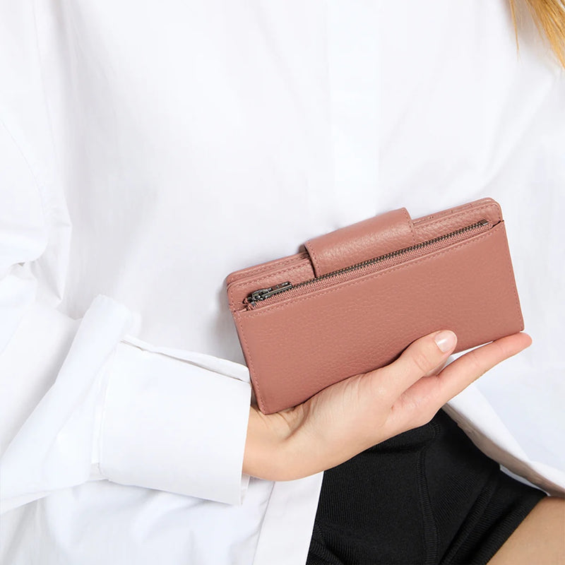 Model carrying the wallet showcasing the back.