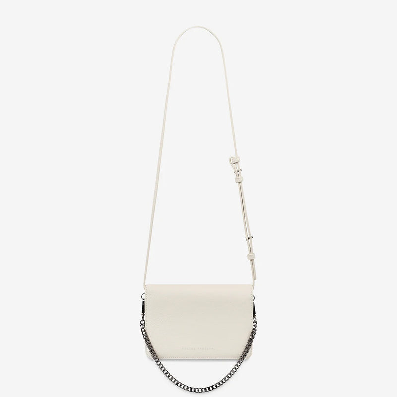 She Burns Leather Bag by Status Anxiety in a chalk colour.