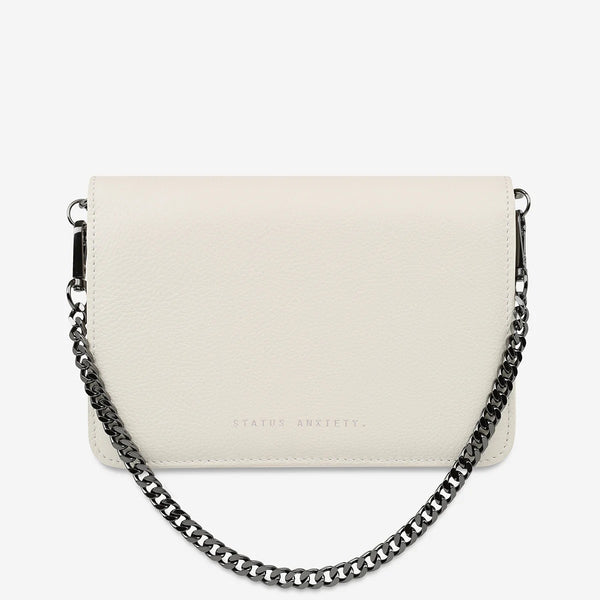 The bag shown with the gunmetal shoulder chain.