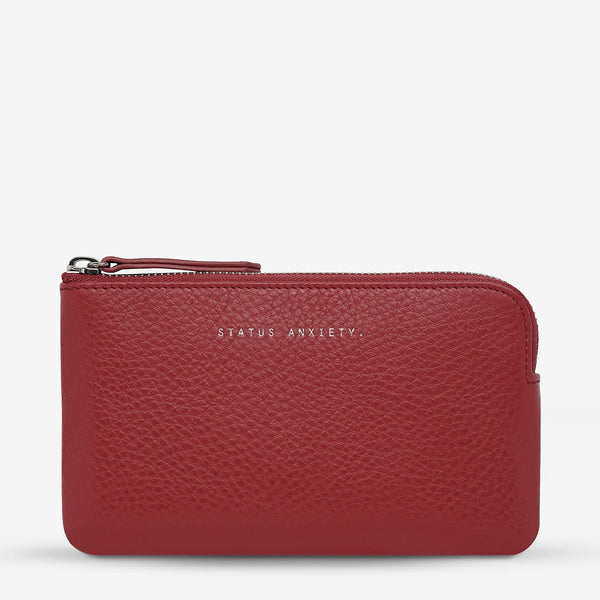 This compact wallet has a zip compartment.
