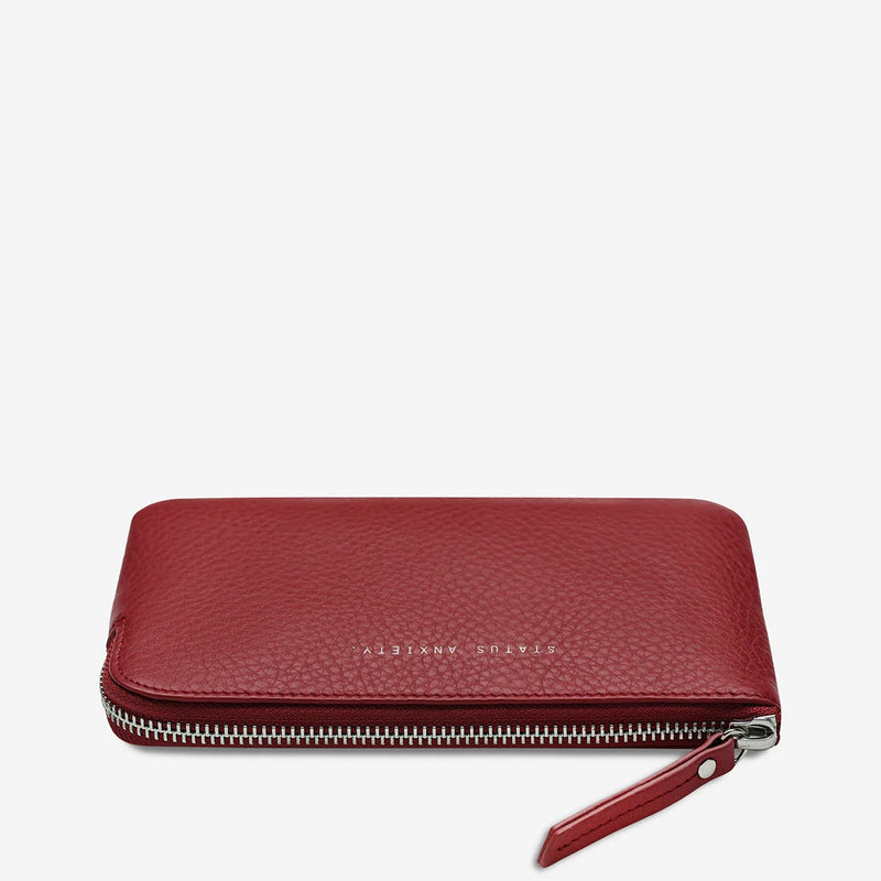 Silver zip closure on the exterior.