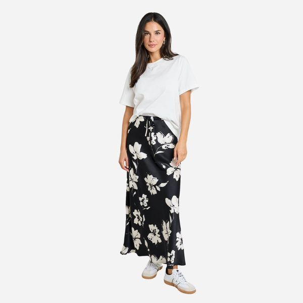 This maxi length skirt has a bold black and white floral print.