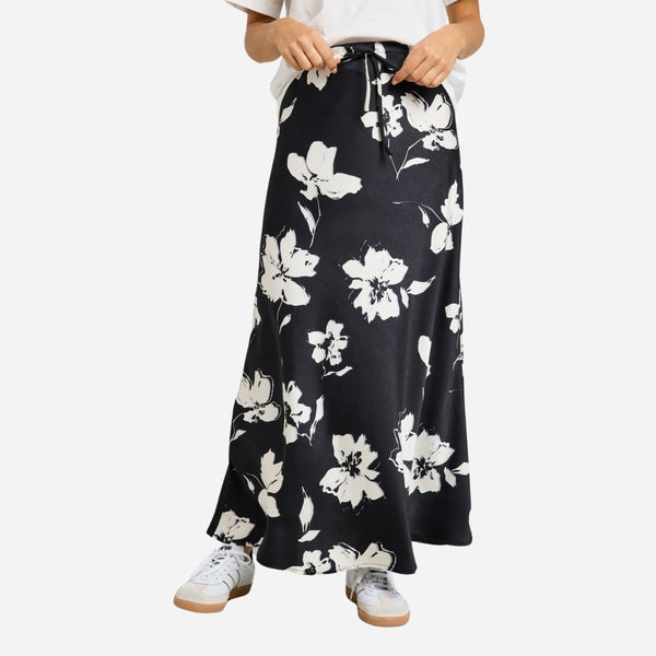 Our Critical Black Floral Satin Skirt has been cut on the bias which creates a beautiful shape.