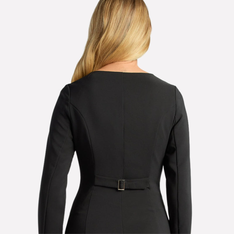 Upper back view of the dress - it features an adjustable belt closure.