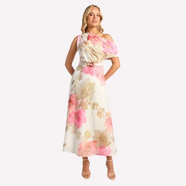 Our Miah Asymmetric Floral Dress has a beautiful muted floral print with a cream base and pink and peach tones.
