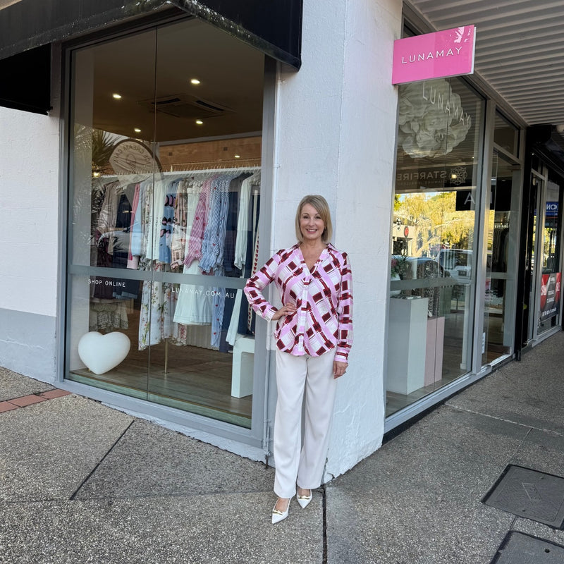 The shirt is worn loose over our Zoe Pants.