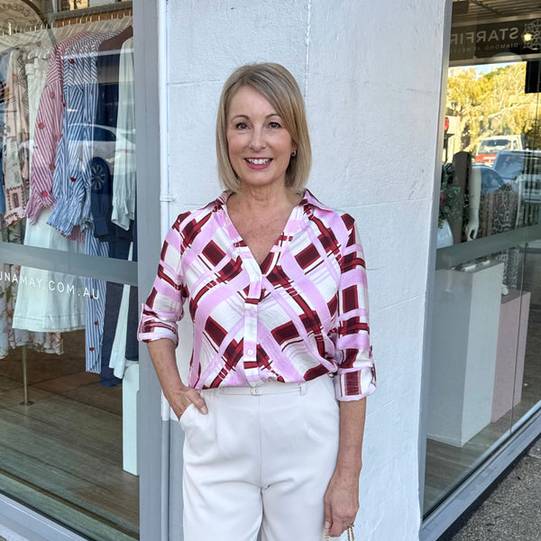 Our Mirren shirt has a burgundy, pink and off-white check print.