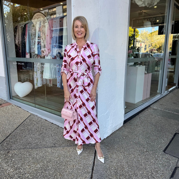 The dress can be accessorised with a pink bag and our Lettie heels.