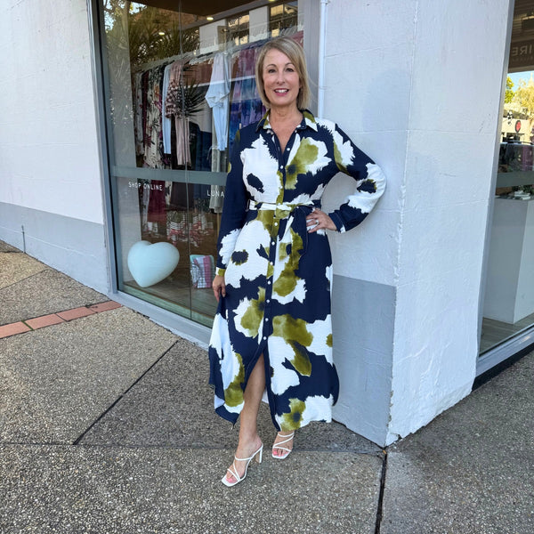 Our Nessa Shirt Dress has a fab abstract print in navy, white and olive green.