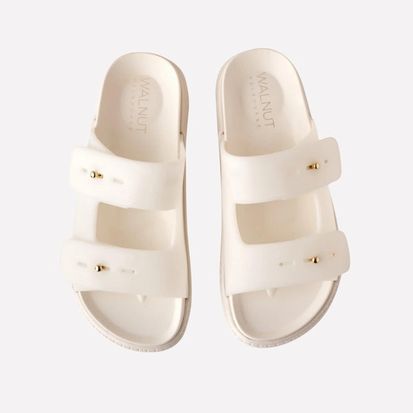 The Tori Slides have two adjustable straps across the foot, finished with a light gold stud detail