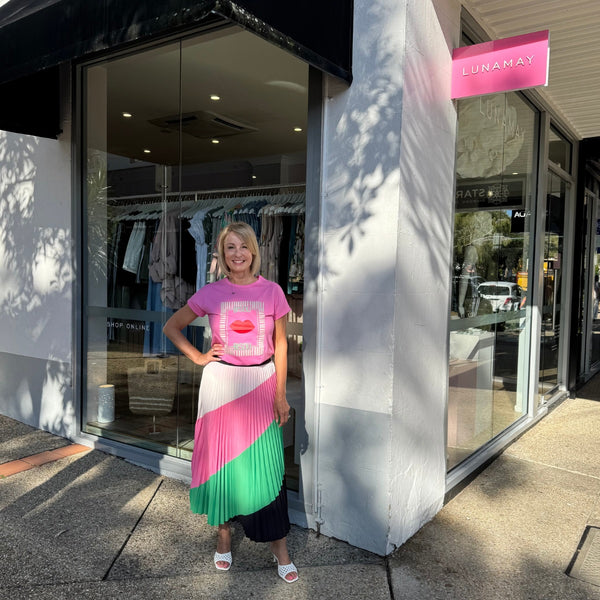 The skirt can be paired with the pink Bisou  Bisou tee.