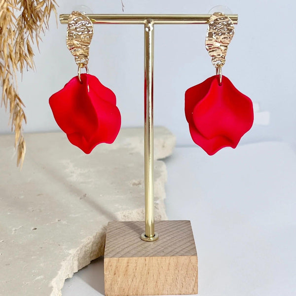 These red petal earrings are suspended from a gold hammered drop stud