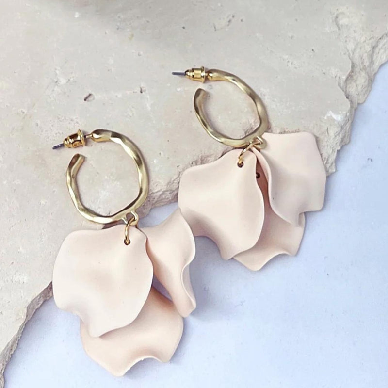 Louisa Petal Earrings with cream coloured petals suspended from a hammered gold hoop with stud closure