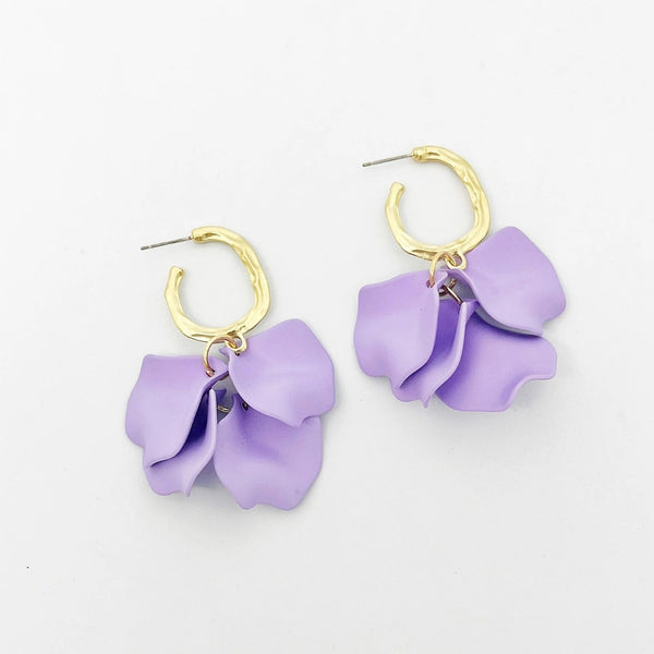 These lavender petal earrings are suspended from a gold hammered hoop