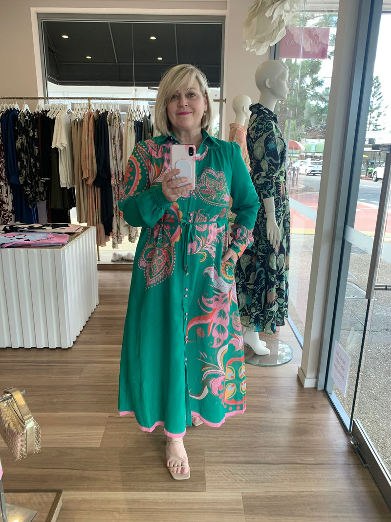 Jill (instore) showcasing the dress cinched with the belt. Wearing Size M and she is typically a Size 14, 170cm tall.