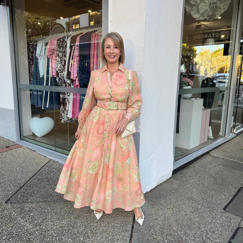 Zaria Maxi Dress in a blush peach and green print.