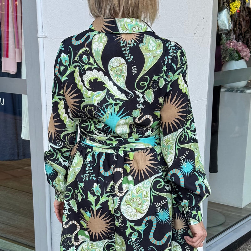 Close up of the upper back view of the dress.